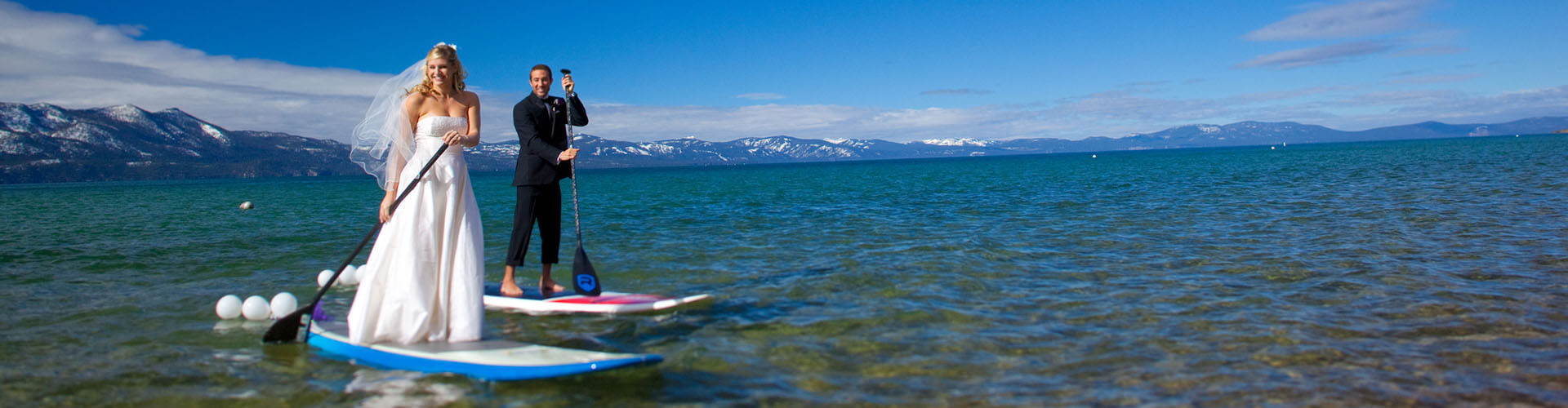 newly weds paddle boarding lake tahoe