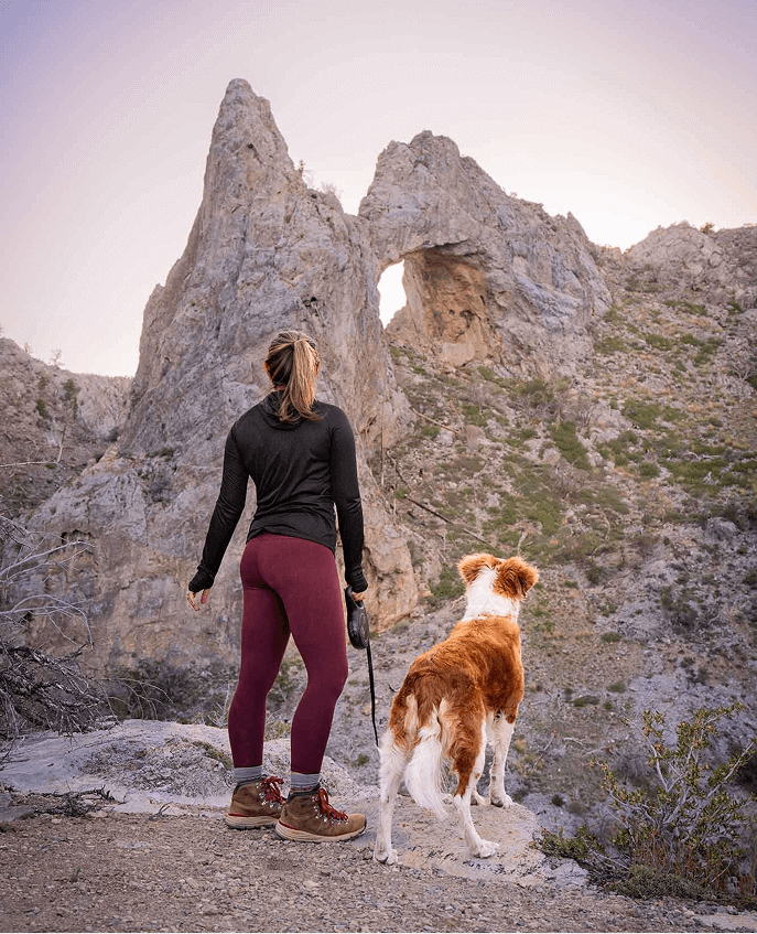 woman hiker with her dog in nevada