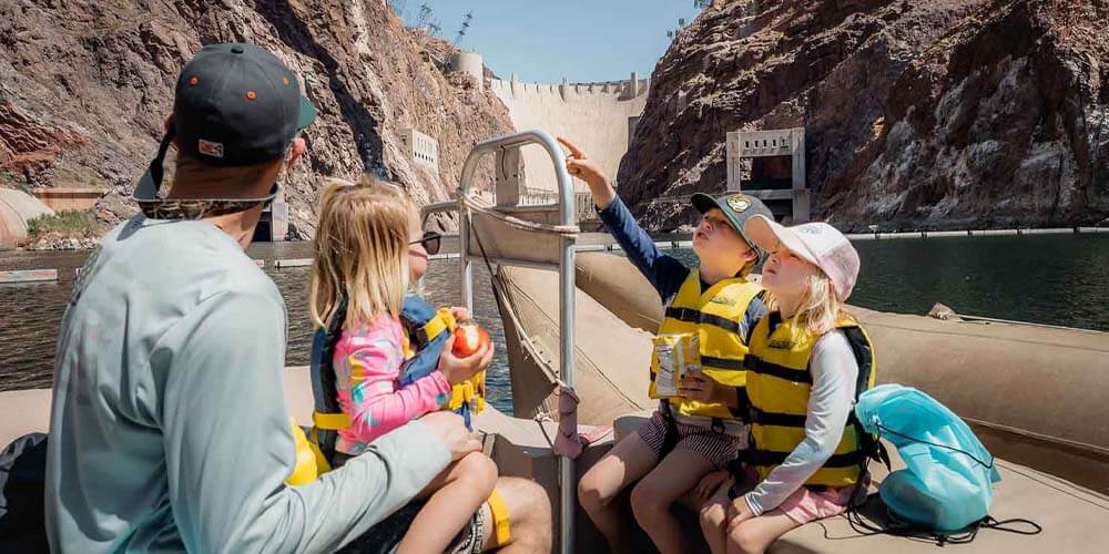family enjoying rafting at hoover dam