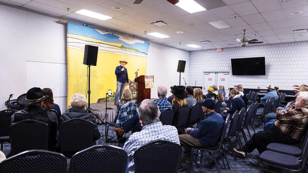 Del nordby performing open mic at cowboy poetry in elko