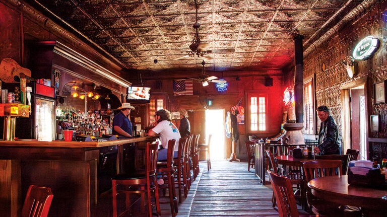 Inside shot of the bar with patrons at the Pioneer Saloon in Goodsprings Nevada