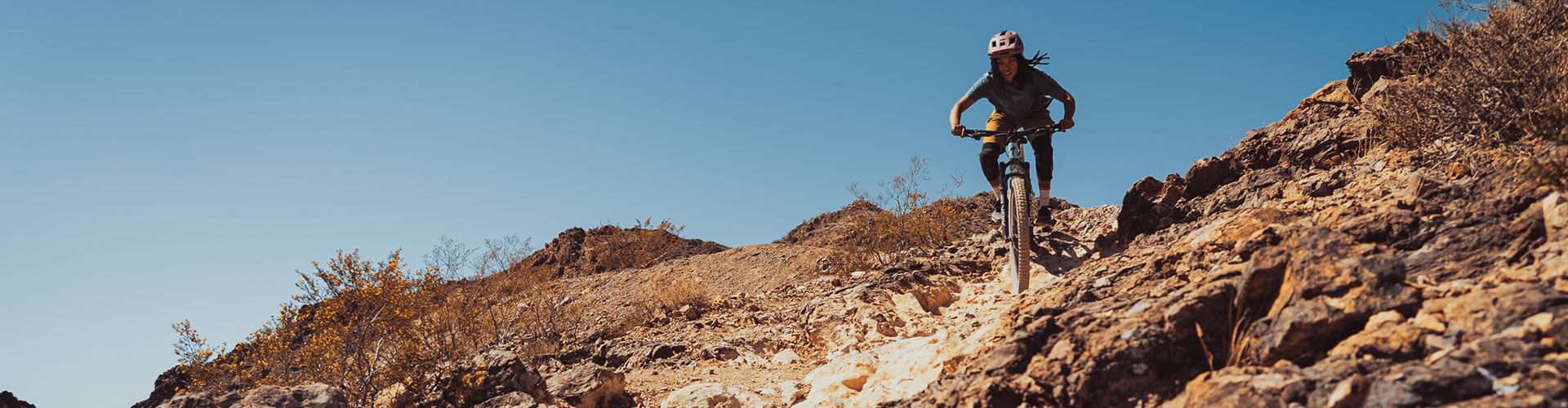woman riding mountain biking trails in nevada