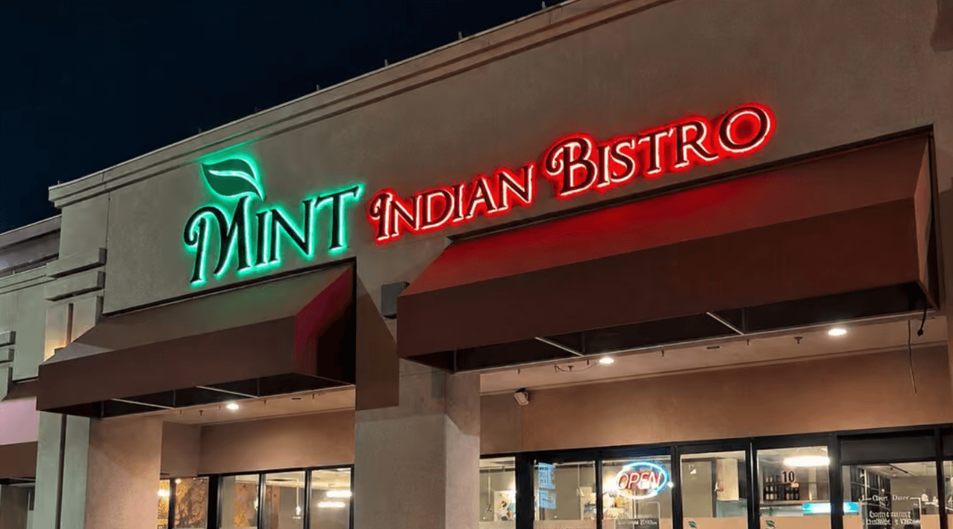 exterior night shot of Mint Indian Bistro